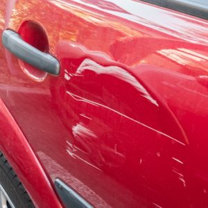 scratches on the side door of the red car collision or accident t20 kRnP7r